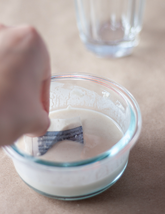 dipped paper squares into the prepared flour paste in a glass bowl