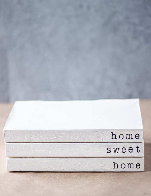 stamped book stacks with the words home sweet home